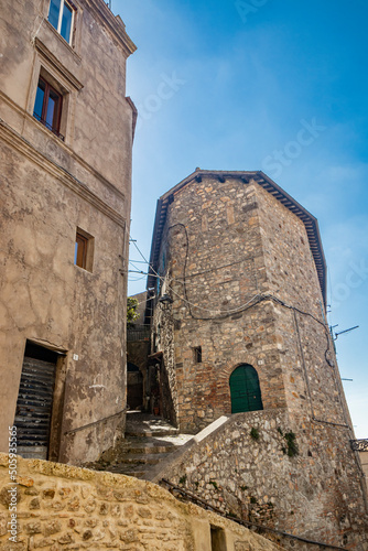 The small village of Tolfa, in Lazio. A glimpse of the town with its old stone and brick houses and cobbled alleys.