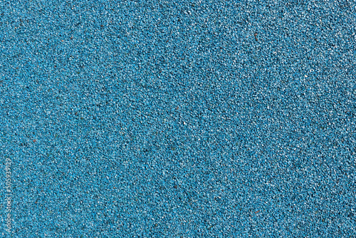 rubber coating for playgrounds applied on the surface by a steel trowel. PDM rubber granules. Coating and floor covering for sports. Rubber mulch for safety and injury prevention