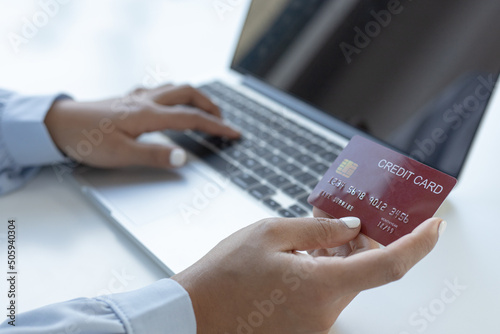 Women use laptop register via credit cards to make online purchases, Using the Internet in Online Marketing and Trading, Online shopping or Internet technology concept.