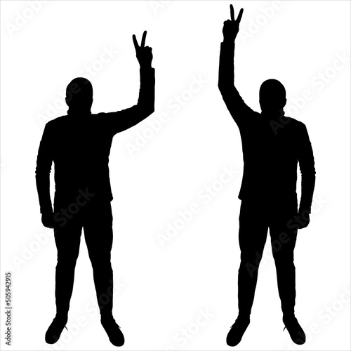 A man shows a hand gesture, "victory". Celebrities at the photoshoot. A young guy of large build stands with his hand raised. Front view, full face. Two black male silhouettes isolated on white