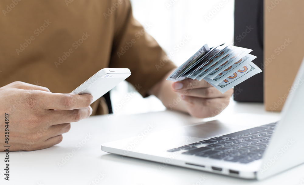 Men use smart phone to register online purchases using credit card payments, Convenience in the world of technology and the internet, Shopping online and banking online concept. Men use smart phone to register online purchases using credit card payments, Convenience in the world of technology and the internet, Shopping online and banking online concept.