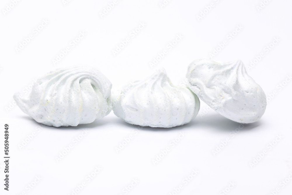 Obraz premium Sweet white meringue isolated on a white background.