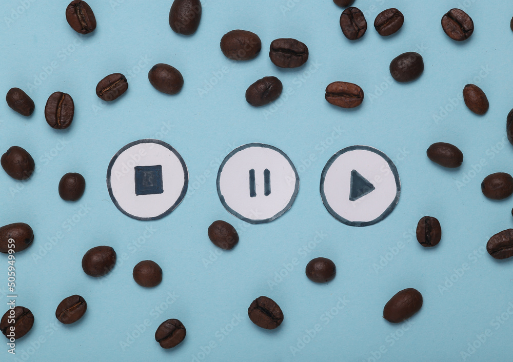 Coffee beans with icons start, stop, pause of media player on blue background. Top view