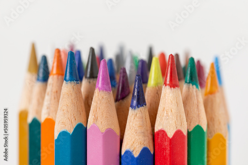 Closeup of sharpened coloring pencils isolated on white background, arts and crafts, back to school concept