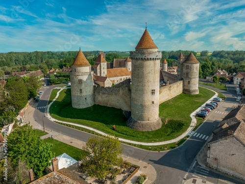 Aerial view of Blandy castle in Northern France typical feudal fortress transferred into lordly residence in Gothic style, hexagonal enclosure,