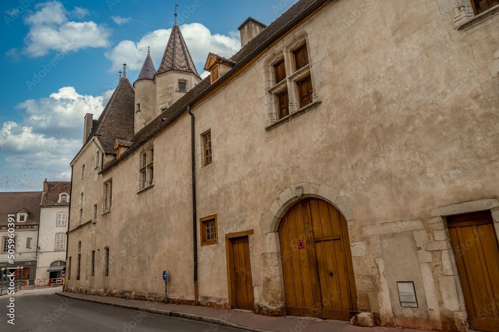 Gothic palace with large windows next to the Hotel Dieu in Beaune France