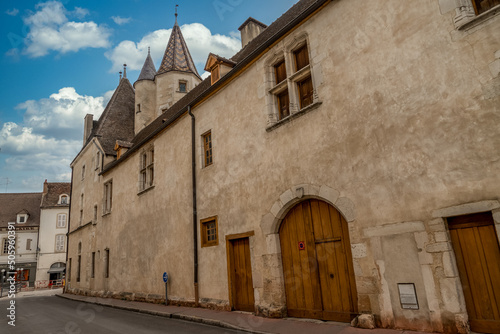 Gothic palace with large windows next to the Hotel Dieu in Beaune France photo
