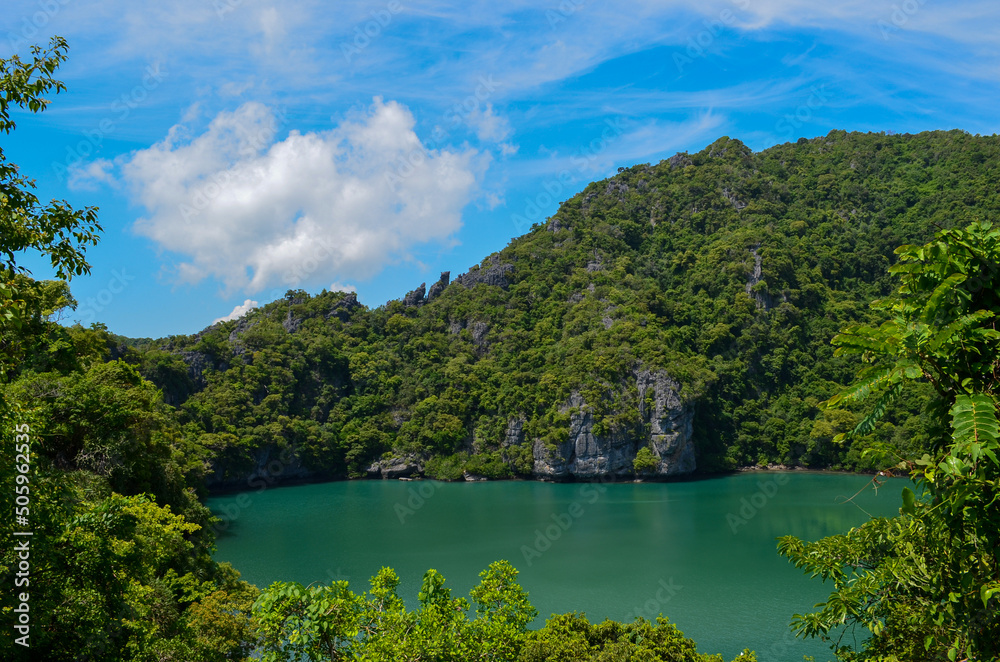 view on the emerald lake hidden in green hills mountains, Thailand nature reserve, Blue lagoon touristic place landmark	