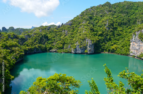 view on the emerald lake located near green hills, Thailand nature, Blue lagoon touristic place