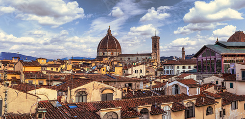 Rooftop view of the Duomo Cathedral in the medieval famous city of Florence, Italy photo