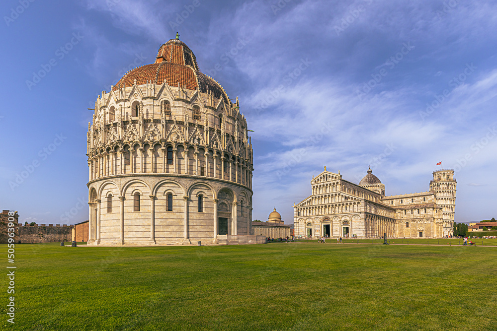 The leaning tower in the central square of the medieval city of Pisa in Tuscany, Italy