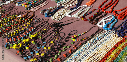 Stall of colorful vintage beaded necklaces at the market
