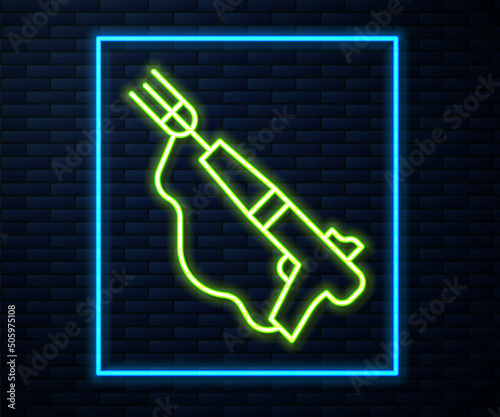 Glowing neon line Fishing harpoon icon isolated on brick wall background. Fishery manufacturers for catching fish under water. Diving underwater equipment. Vector