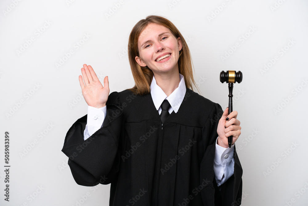 Judge English woman isolated on white background saluting with hand with happy expression Judge English woman isolated on white background saluting with hand with happy expression