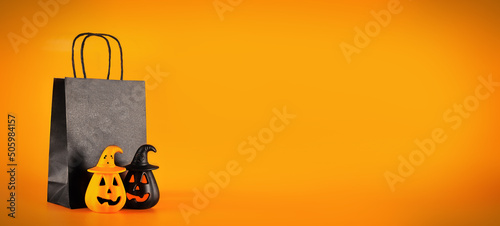 wide banner, happy halloween on orange background. Special offer symbol. Celebration concept. Discount offer price sign