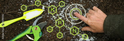 Farmer hand touch Green technologies agriculture digital mineral nutrients icon. Potassium nitrogen Organic fertilizers, garden tools soil. Smart Solve Fertilizer Crisis. Top view Future agriculture photo