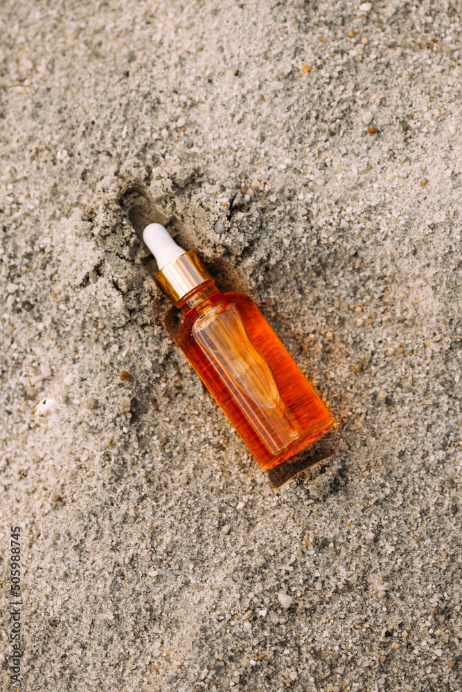 bottle mockup with dropper on nature background. bottle mockup with dropper on nature background.