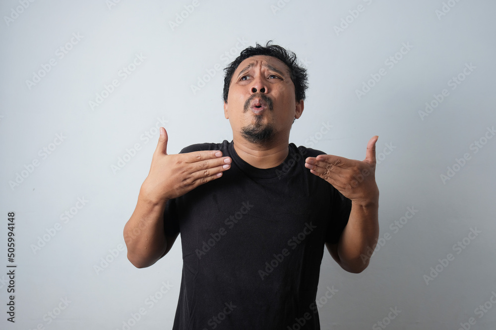 Fototapeta premium funny expression of overheated man while waving his hands
