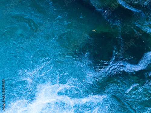 Turquoise river water and waves © KKleaf