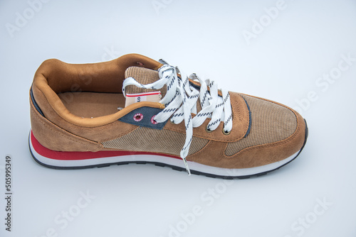 brown sport shoe on white background