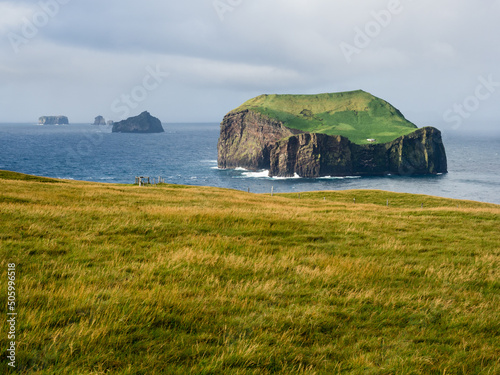 Scenic view from Storhofdi lookout at the southernmost end of Heimaey Island - Westman Islands, Iceland photo