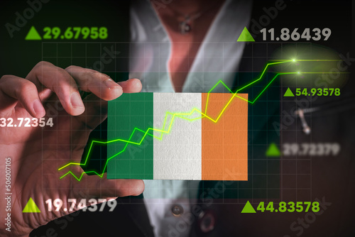 Graph growing up in Front Of Ireland Flag. business state growing up concept. 