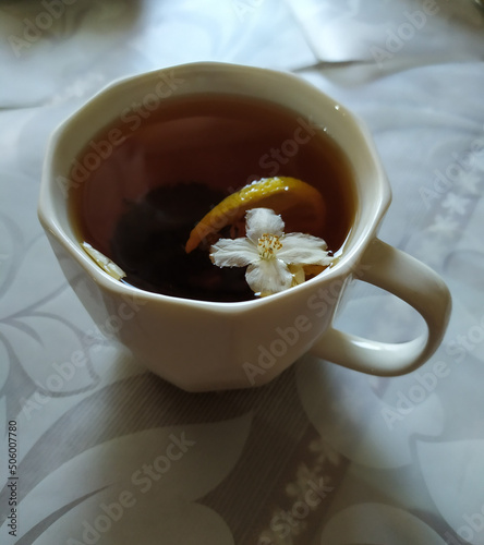 A cup of tea with jasmine and lemon
