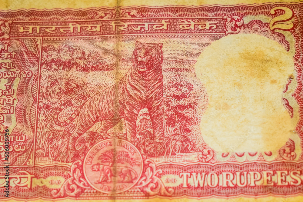 Fototapeta premium Old Two Rupee notes combined on the table, India money on the rotating table. Old Indian Currency notes on a rotating table, Indian Currency on the table