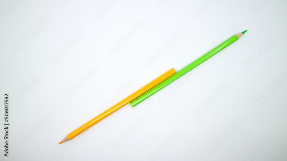 Two color pencil on white background with copy space Two color pencil on white background with copy space