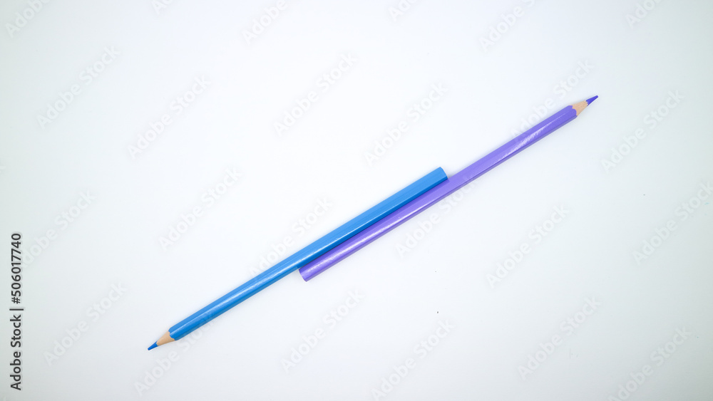 Two color pencil on white background with copy space Two color pencil on white background with copy space