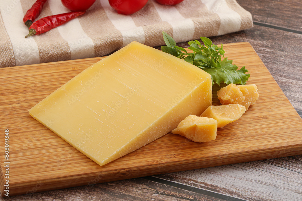 Parmesan hard cheese with small pieces Parmesan hard cheese with small pieces
