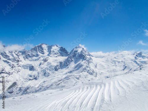 Alpine summits, and glaciers in the skiing area of Piz Corvatsch photo