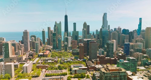 Expensive residential area with skyscrapers in Chicago. Sunny day footage in the urban city against scenic Michigan Lake. photo