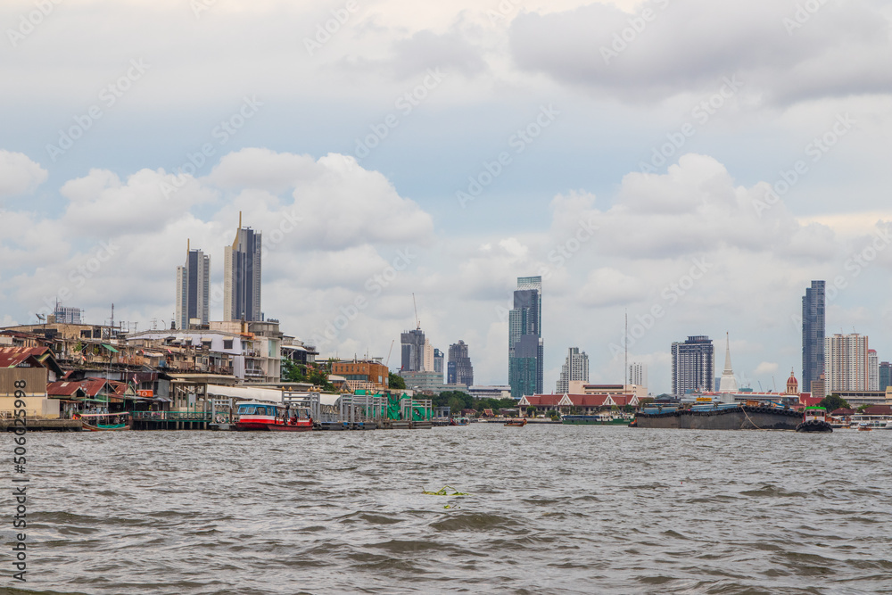 A Tug boat with a cargo ship on the Chao Phraya River in Bangkok Thailand Southeast Asia A Tug boat with a cargo ship on the Chao Phraya River in Bangkok Thailand Southeast Asia