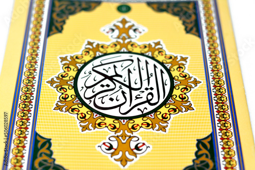 The holy Quran, Qur'an or Koran (the recitation), the central religious text of Islam, believed by Muslims to be a revelation from God (Allah), Translation of the Arabic text ( The Noble Quran ) photo