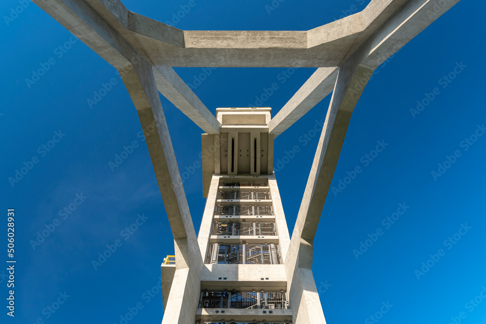 Mine shaft tower "Prezydent" in former coal mine "Königsgrube” ("Król") in Chorzów, Silesia, Poland. Detail of the construction. Tall, concrete, industrial construction build in 1933. - obrazy, fototapety, plakaty 