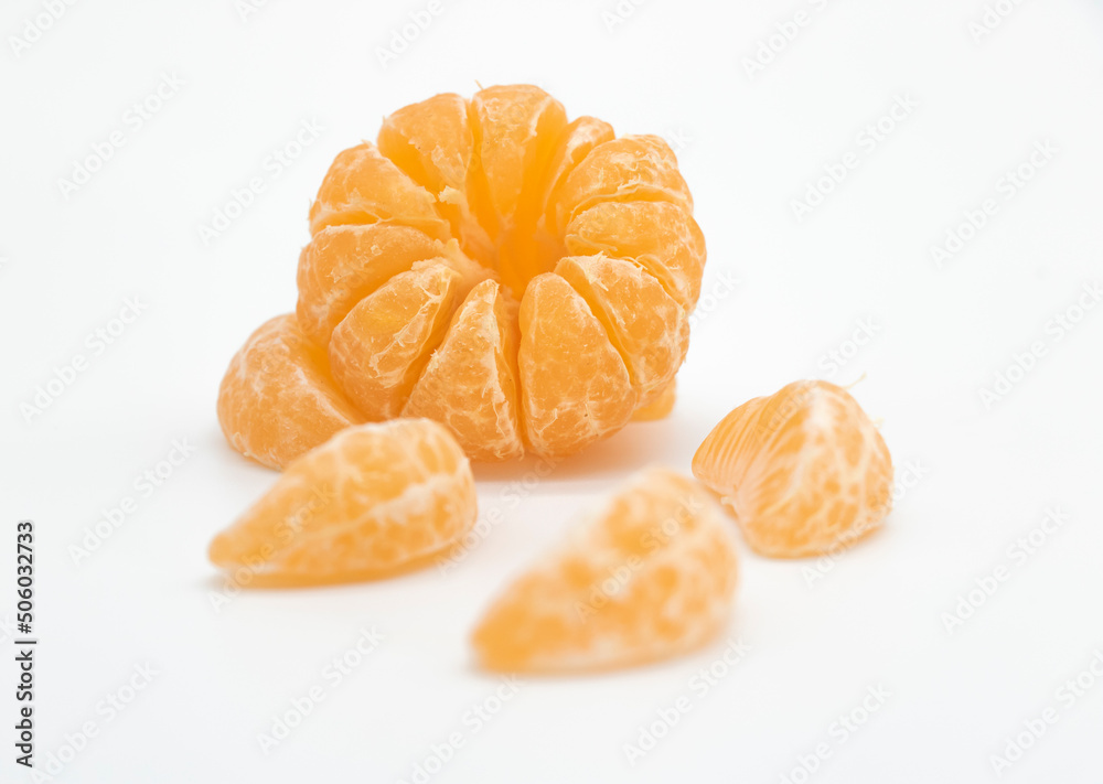 Tangerine or kamala with pieces isolated on white background Tangerine or kamala with pieces isolated on white background