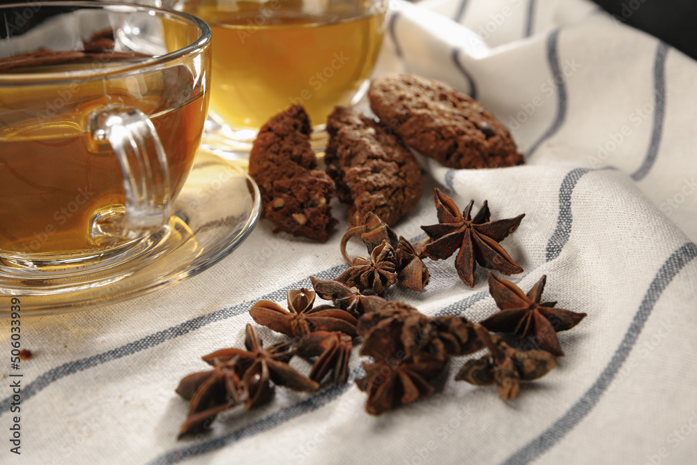 Two cups of herbal tea and cookies on kitchen cloth Two cups of herbal tea and cookies on kitchen cloth