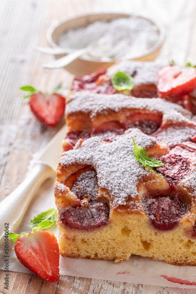 Rustic and fresh strawberry cake made of fruits and mint.