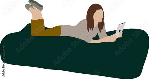 Girl with a tablet lies on a green pouf