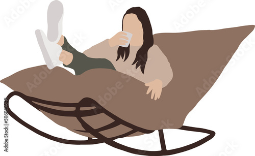 Girl with a cup of coffee sits on a rocking chair