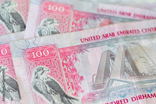 One hundred dirhams banknotes, UAE dirhams, paper money, closeup view photo