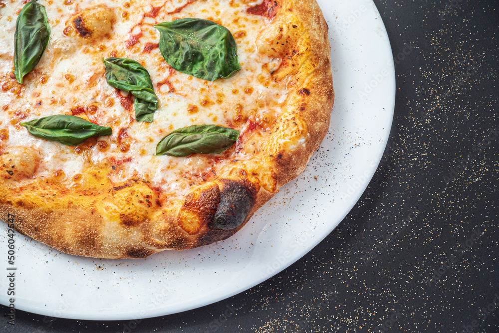 pizza on the black background, top view pizza on the black background, top view