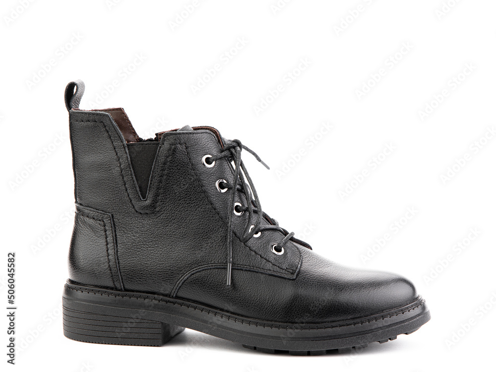 Women's autumn black leather jodhpur boots with laces and average heels, isolated white background. Right side view. Fashion shoes.