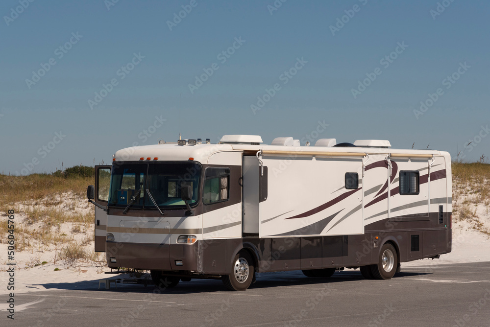 Pensicola Beach, Florida, USA. 2022.  Recreational vehicle parked up close to the beach in Pensicola, Florida, USA.