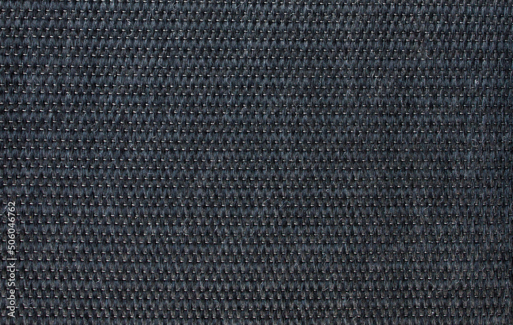 Sunscreen fabric for gray blinds. Gray fabric texture for background Sunscreen fabric for gray blinds. Gray fabric texture for background