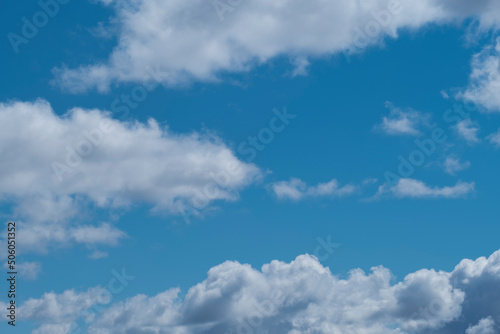 Blue sky with white clouds. Heavenly landscape background.