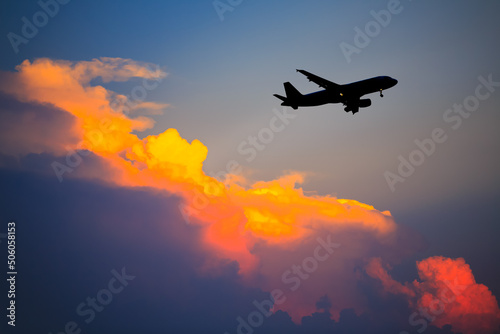 Silhouette of Airplane in the sky.