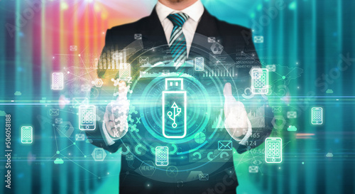 Businessman holding technology icon concept