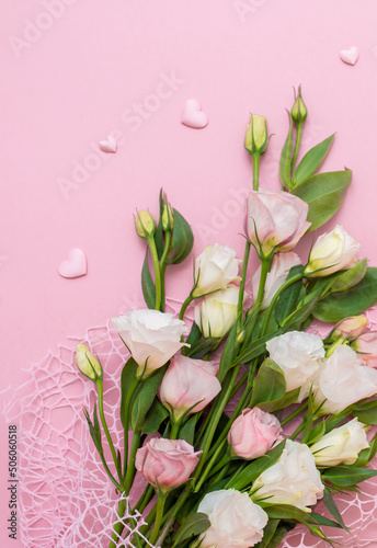 Fototapeta Naklejka Na Ścianę i Meble -  Festive bouquet of flowers for the beloved on a pink background. The concept of love congratulations on the wedding, March 8, Valentine's Day, Christmas and birthday. Copy space.